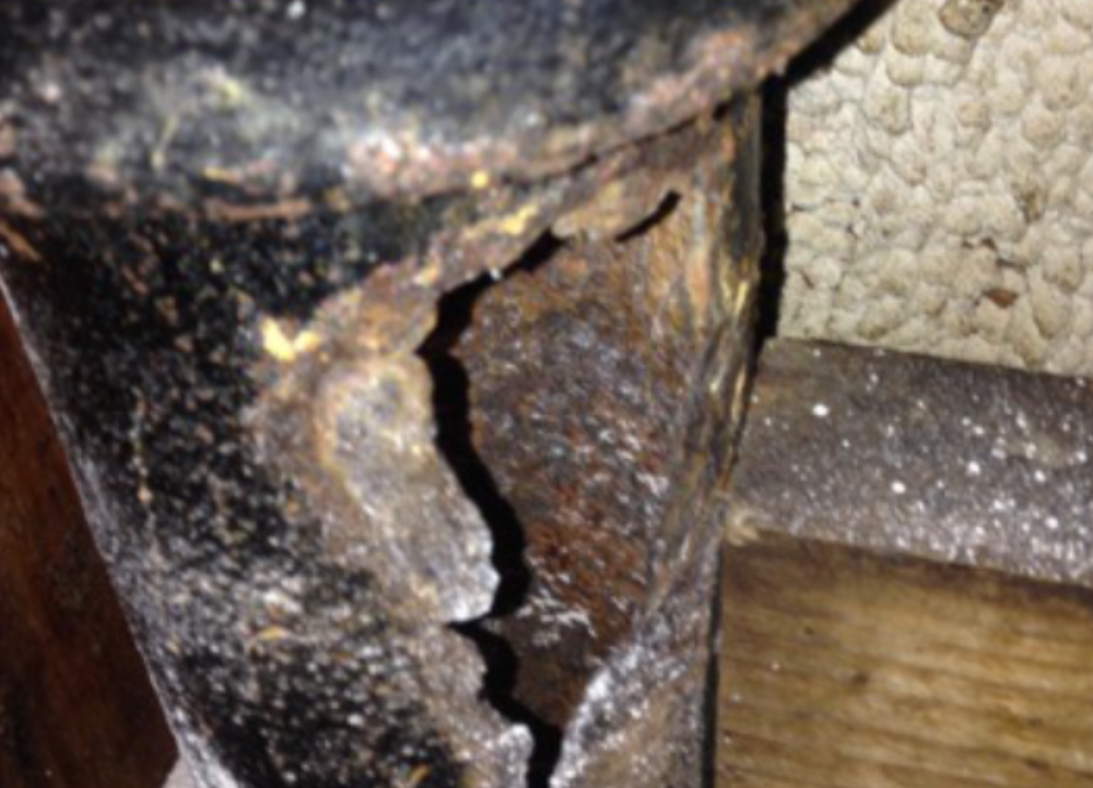 Rat entry through corroded cast iron pipe